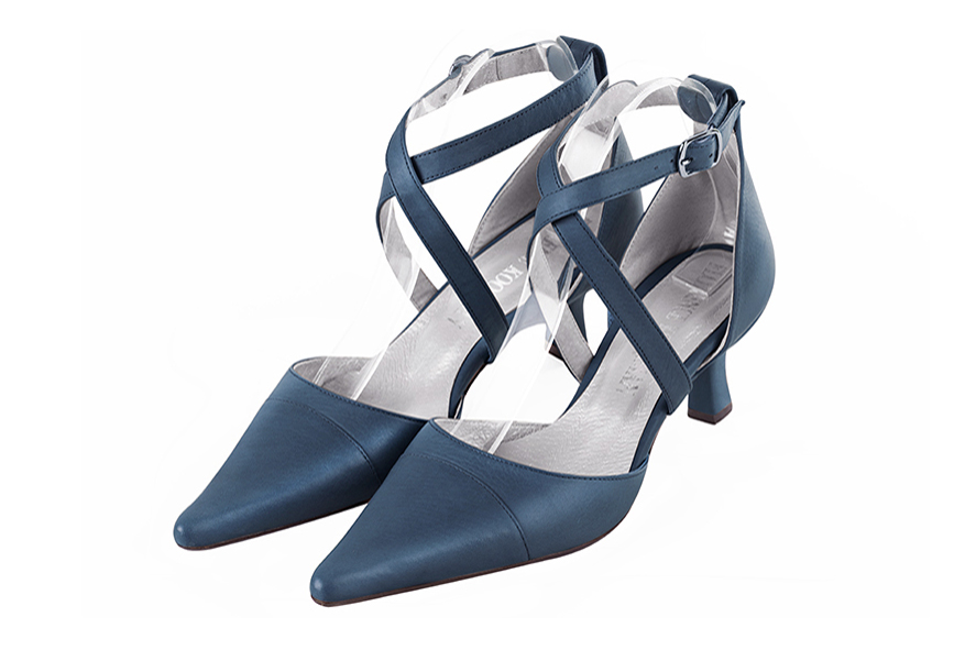 French elegance and refinement for these denim blue dress open side shoes, with crossed straps, 
                available in many subtle leather and colour combinations. Perfect model to feminize and enhance basic outfits.
Its adjustable straps will allow you a good support.
To personalize or not, according to your outfits or your desires.  
                Matching clutches for parties, ceremonies and weddings.   
                You can customize these shoes to perfectly match your tastes or needs, and have a unique model.  
                Choice of leathers, colours, knots and heels. 
                Wide range of materials and shades carefully chosen.  
                Rich collection of flat, low, mid and high heels.  
                Small and large shoe sizes - Florence KOOIJMAN